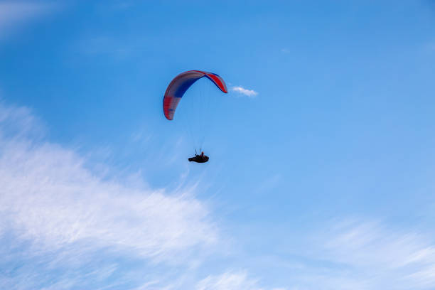 istock Paraglider flying over Scenic Mountain Range in Canadian Nature 1282147325