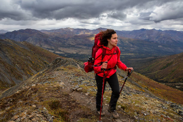 istock Woman Backpacking on Scenic Rocky Hiking Trail 1282148708