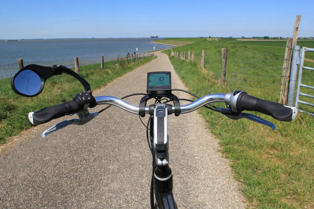 istock a bicycle handlebar at a dike crossing along the westerschelde sea 1282149245