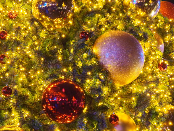 istock Christmas background. Christmas decorations balls, light, star, snowflake on Christmas tree. 1282149273