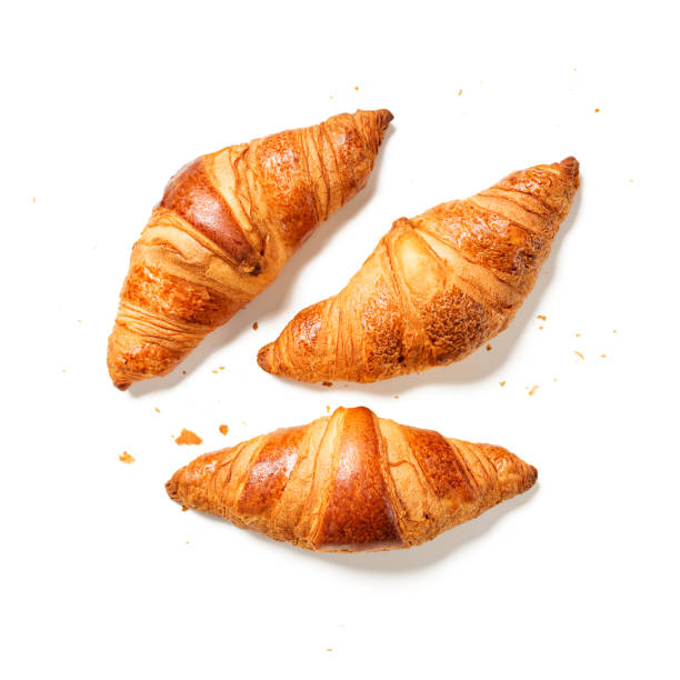 istock Three fresh croissants isolated on a white background 1282153089