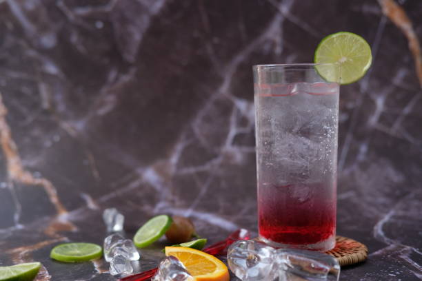 istock summer drink with lemonade isolated on table background and alcoholic cocktail 1282153690