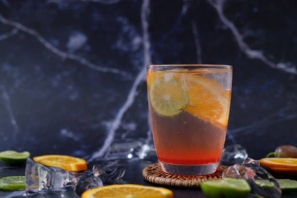 summer drink with lemonade isolated on table background and alcoholic cocktail