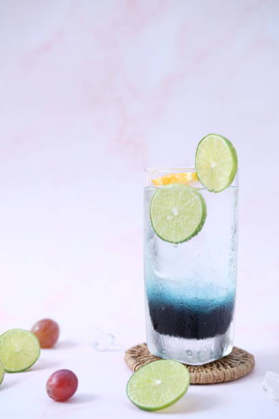 istock summer drink with lemonade isolated on table background and alcoholic cocktail 1282156217