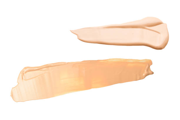 istock Liquid foundation swatch isolated on white background. Close Up of makeup cream sample. 1282159117