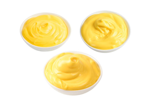 istock Cheese sauce in white plate on white background. 1282159258