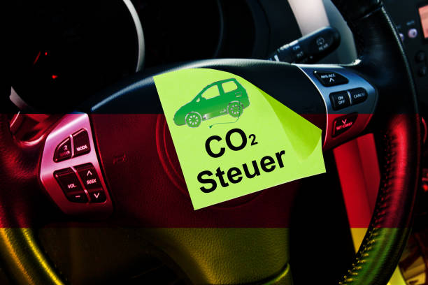 istock Car dashboard black red gold with Post It CO2 tax 1282160549