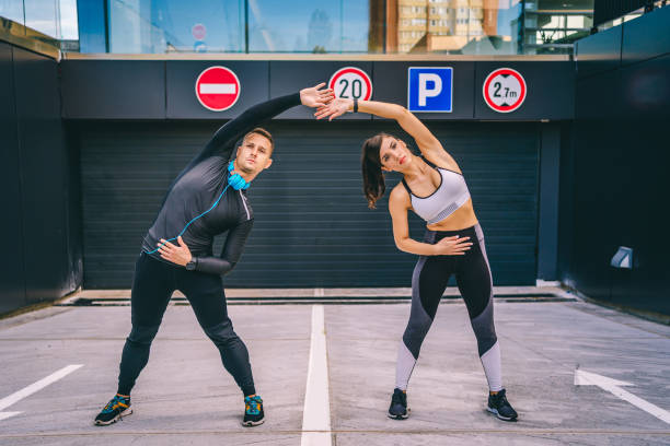 istock Fit couple stretching outdoor 1282163789