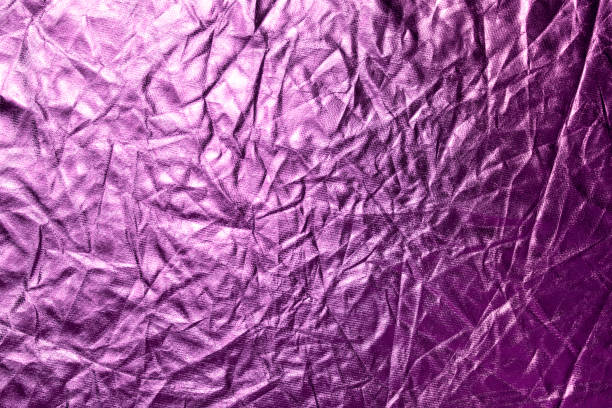 istock Purple crumpled metallic paper texture background. 1282164446