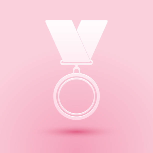 istock Paper cut Medal icon isolated on pink background. Winner symbol. Paper art style. Vector 1282167187