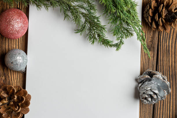 istock Blank notebook sheet for copy space with fir, spruce branches and Christmas tree toys 1282168432