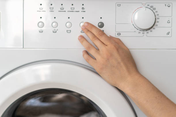 istock Modern washing machine equipment stands at home 1282168920