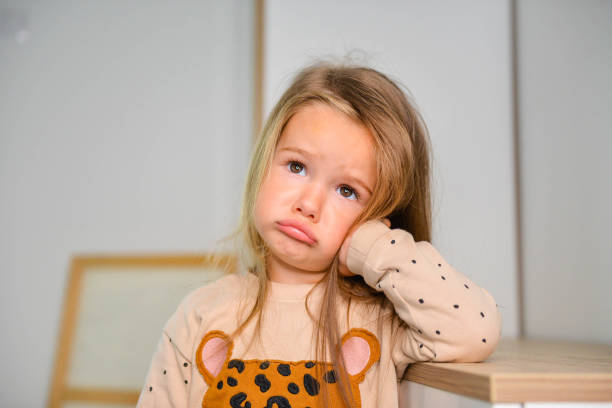 Very upset Little and cute angry girl sulking stock pictures, royalty-free photos & images