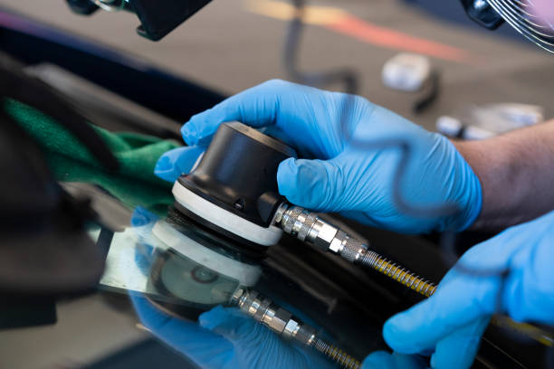 istock Broken car glass being repaired 1282175035