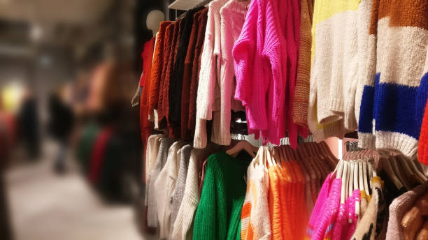 istock Sweaters on a hanger in a store - blurred background 1282176731