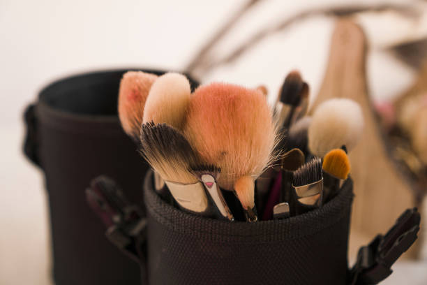 istock Makeup brushes in a makeup artist case on blurred background 1282176780