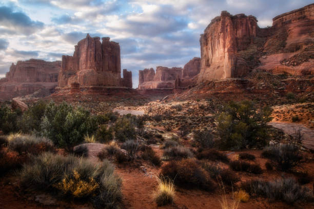 istock Morning Clouds Over Arches National Park in Moab Utah 1282177209