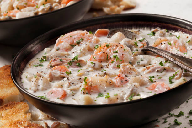 istock Seafood Chowder with Shrimp, Bay Scallops, Clams and Salmon 1282187079