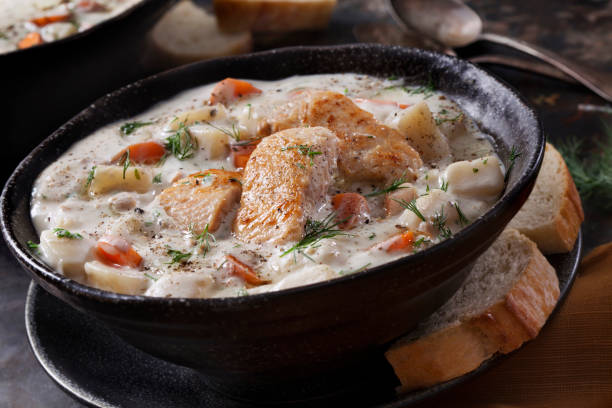 istock Butter Poached Salmon Chowder with Potatoes, Carrots and Fresh Dill 1282187092