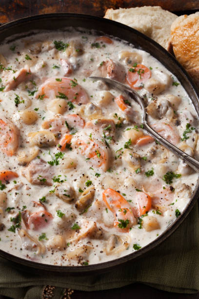 istock Seafood Chowder with Shrimp, Bay Scallops, Clams and Salmon 1282187144