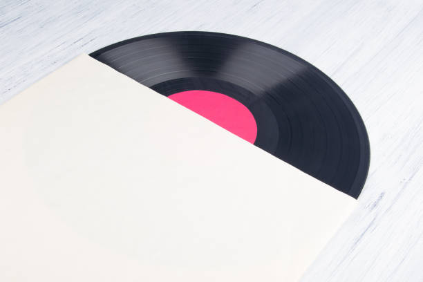 istock background, vinyl record from paper packaging top view 1282188371