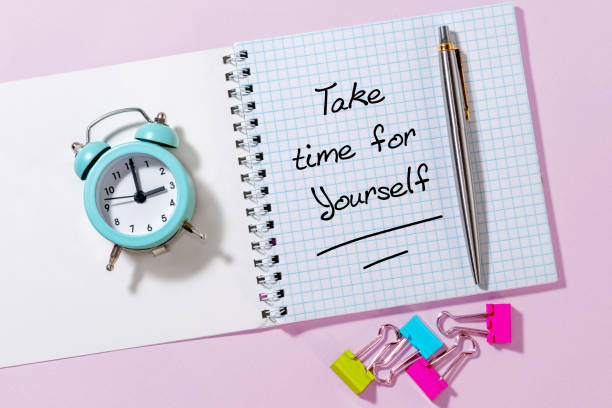 istock Take time for yourself. Motivational quote and alarm clock on light background. Top view Flat lay Copy space Concept inspirational quote of the day 1282189633