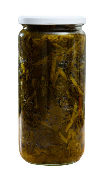 istock Canned green spinach in glass jar 1282191879