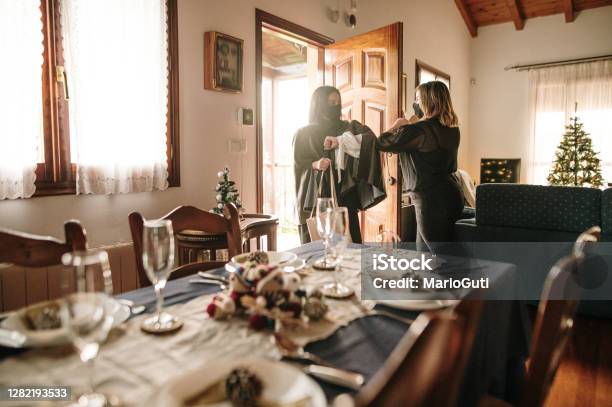 Coming Over For Christmas Dinner During The Covid19 Pandemic Stock Photo - Download Image Now