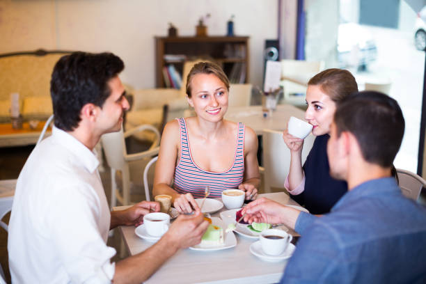istock Four frineds are meeting 1282196710
