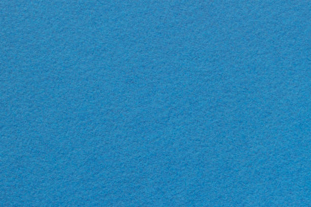 istock Texture of blue craft paper for artwork. Modern background, copy space 1282199110