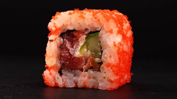 istock Single california sushi roll with caviar and tuna fish. 1282199216