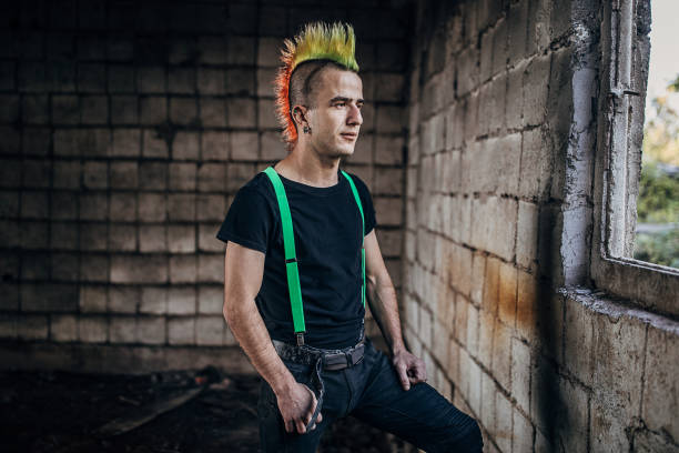 istock Panker standing in abandoned warehouse and looking through the window 1282202641