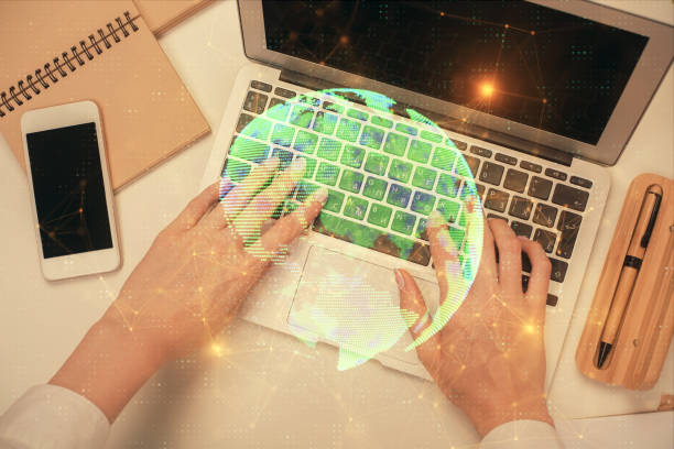 istock Double exposure of woman hands working on computer and social network theme hologram drawing. Top View. People connection concept. 1282202909
