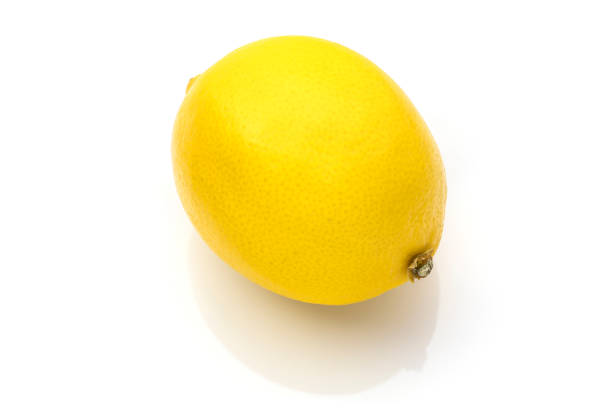 Lemon placed on a white background. stock photo