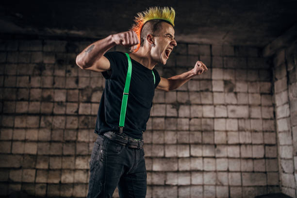 istock One angry panker screaming in abandoned warehouse 1282203877