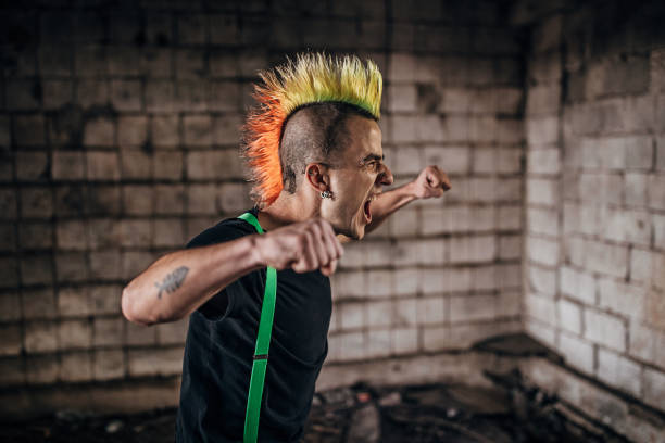 istock Angry panker screaming in abandoned warehouse 1282203901