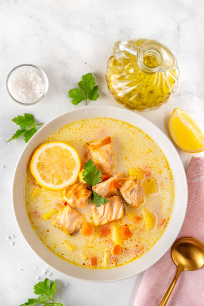 istock Salmon fish soup on white background 1282206087