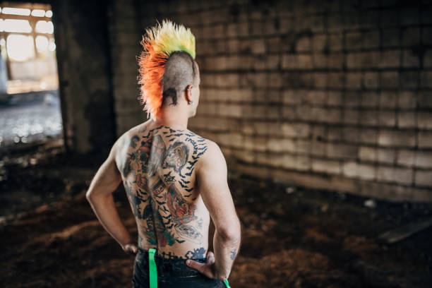 istock Rear view of one panker with tattoos on back 1282207129