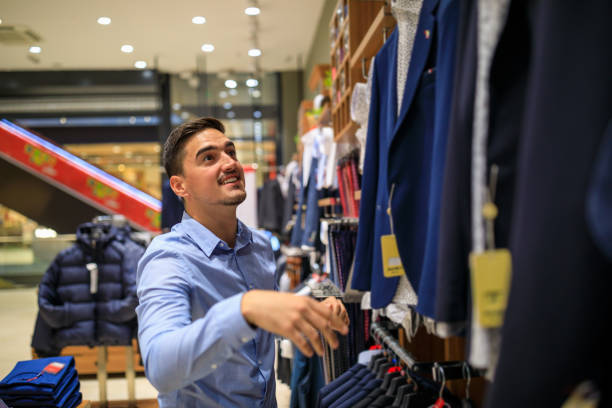 istock Man buying formal clothes at a store 1282209165