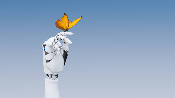 Gentle robot hand A yellow butterfly poised on a robot finger robotic arm photos stock pictures, royalty-free photos & images