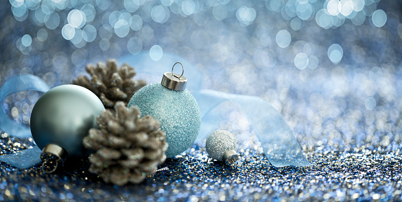 Christmas Blue Baubles on a Blue Background. Very Shallow Depth.
