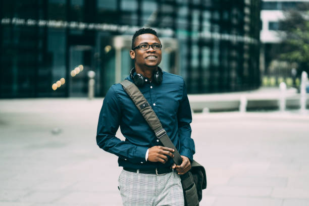 istock Afro man in front of cityscape 1282215306