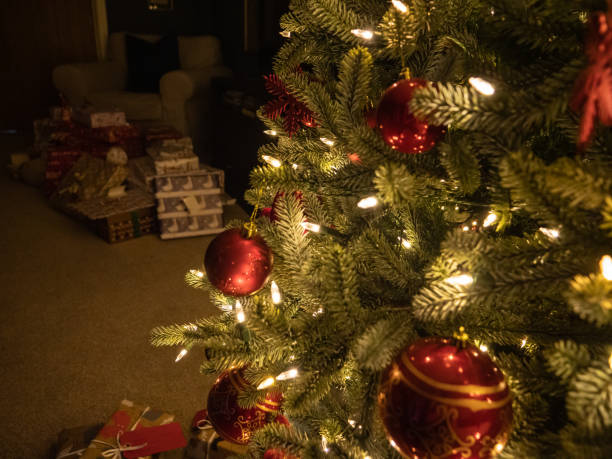 istock A christmas tree with fashionably wrapped presents placed underneath 1282216124