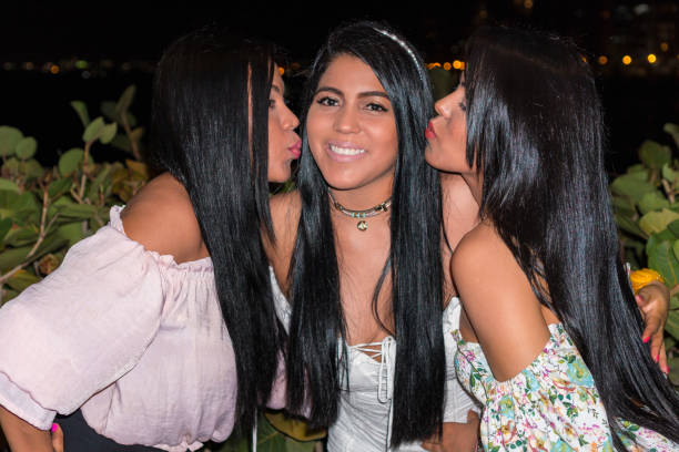 istock Beautiful young women having fun at night 1282217151