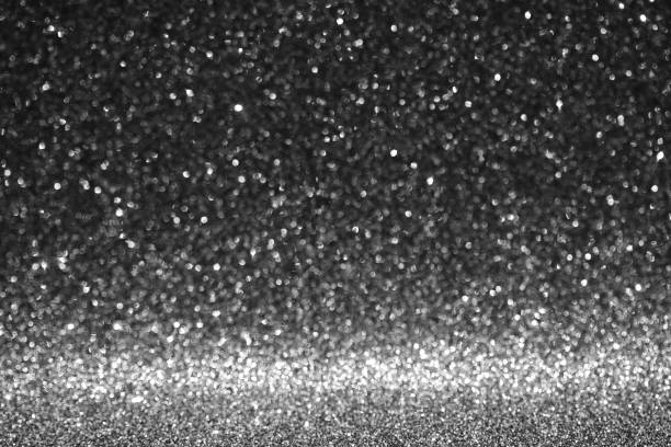 istock black glitter texture christmas abstract background, Defocused 1282218098