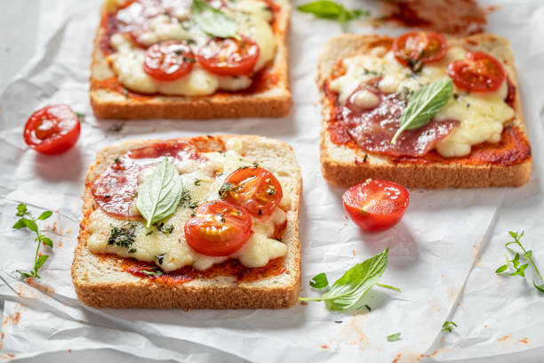 istock Rustic Toast with salami, cheese and tomato 1282218840