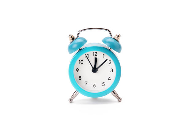 istock old blue alarm clock isolated on a white background. copy space. studio shot. time symbol. schedule concept 1282218860