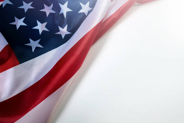 istock Close up of American flag on white blank space for text. 1282220705