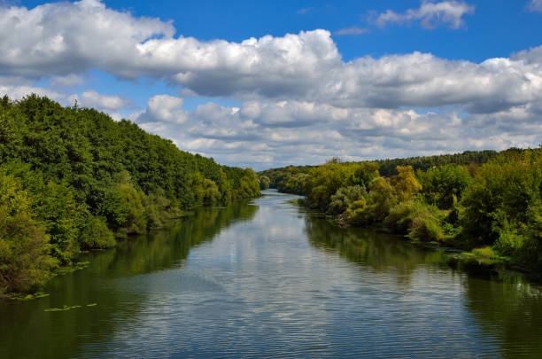 istock River among the wooded coasts against the blue sky 1282222442