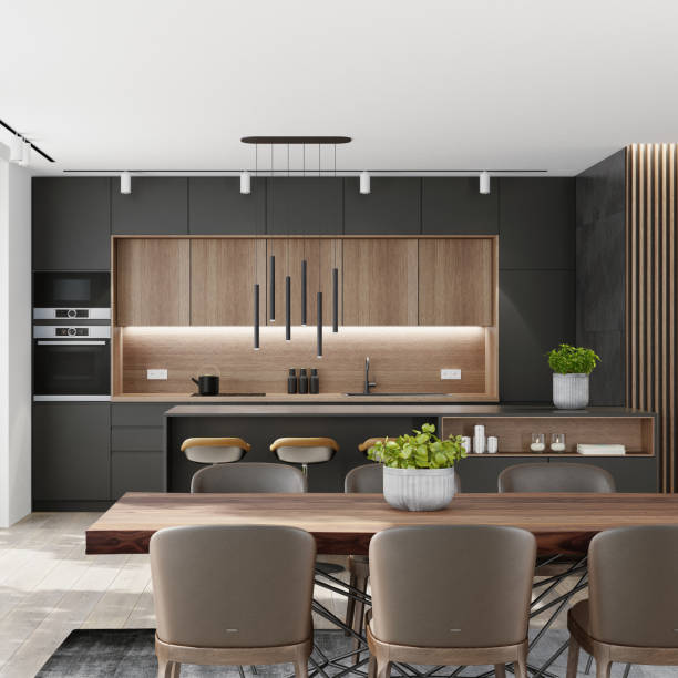 istock Country modern villa with garden. Matte black kitchen interior with island table and dining table. 1282226518